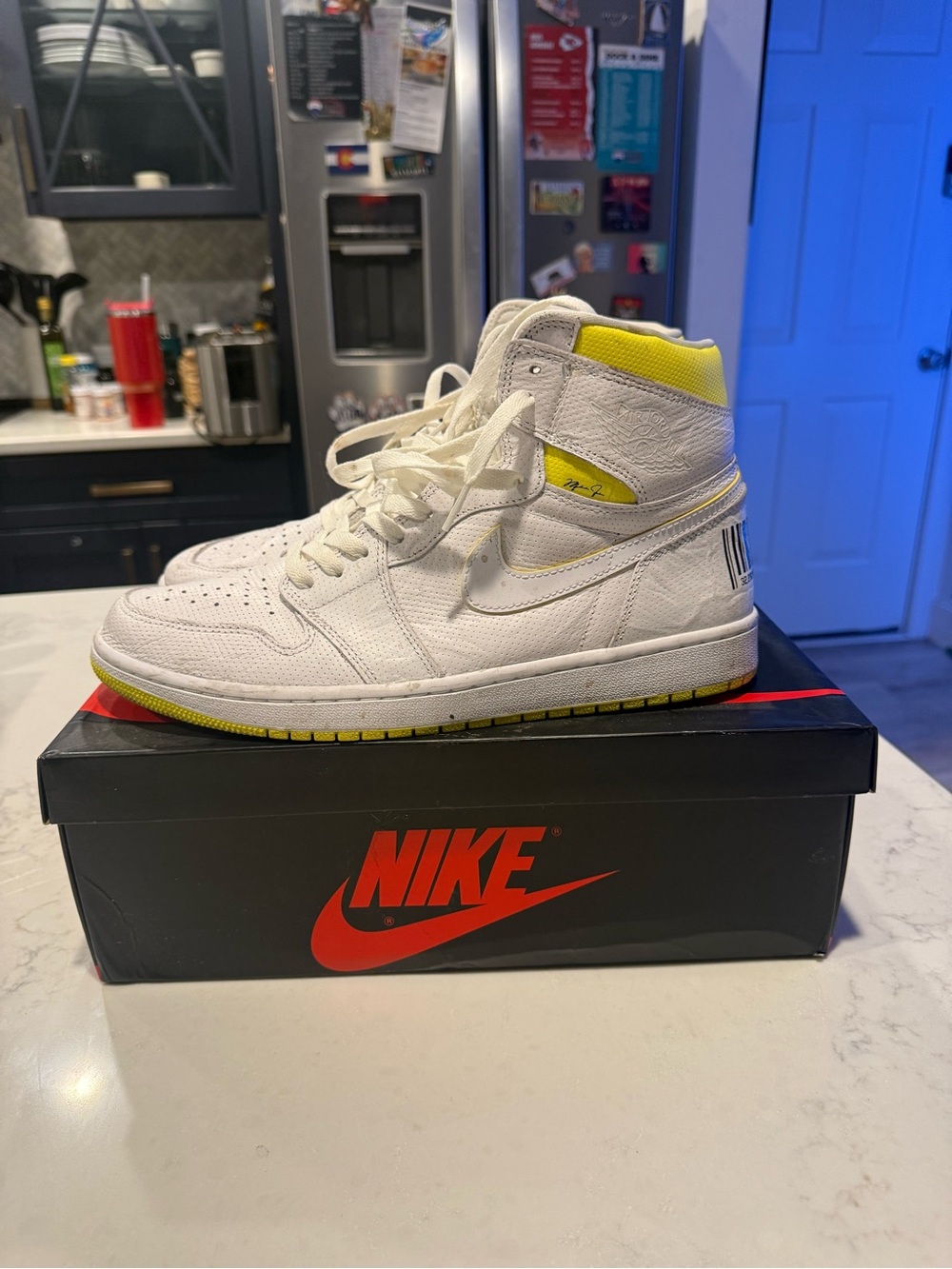 Nike Kids White High-Top Sneakers with Yellow Accents